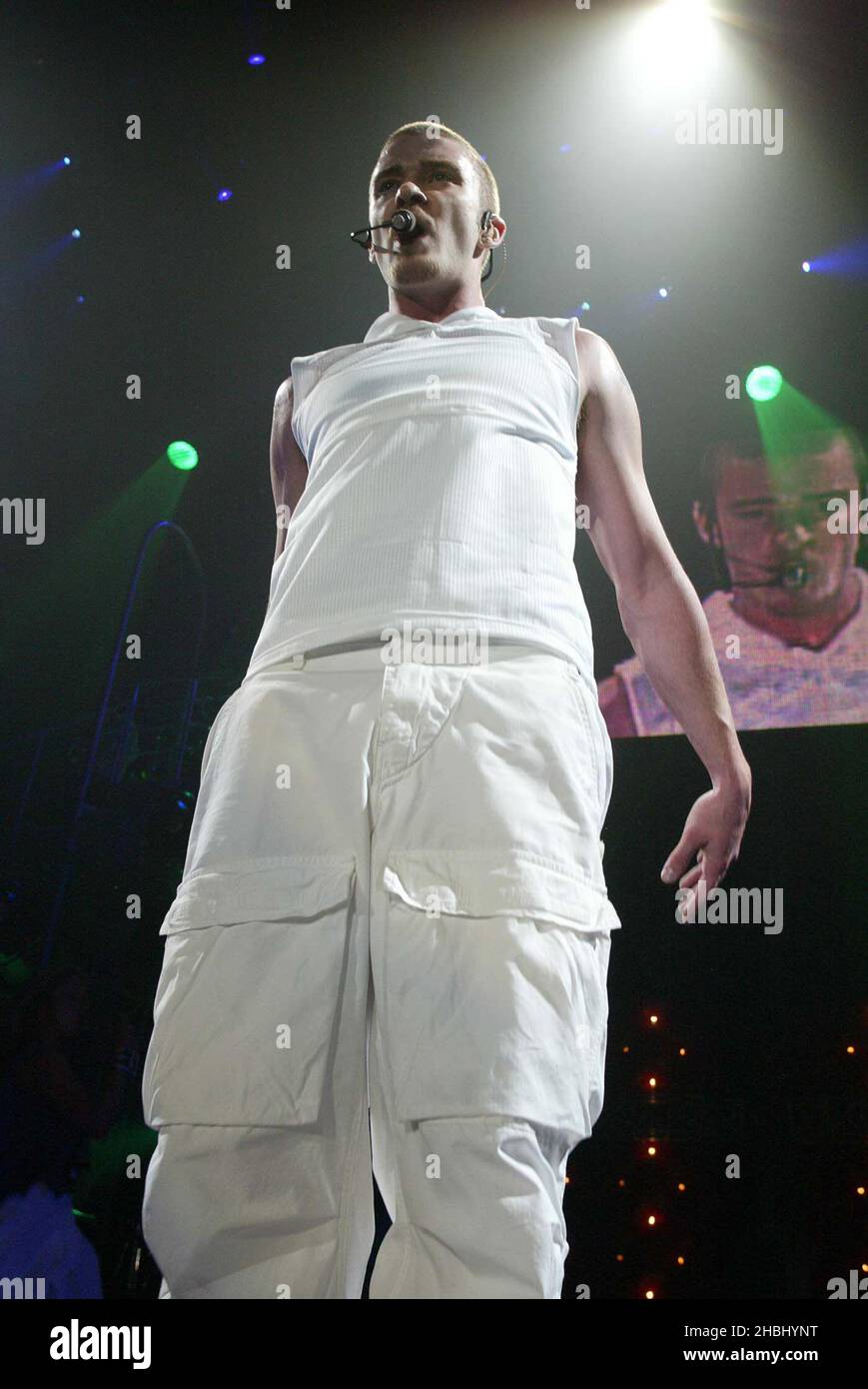 Justin Timberlake performs live on stage at the Sheffield Arena. Three quarter length, white vest, combat trousers. Stock Photo