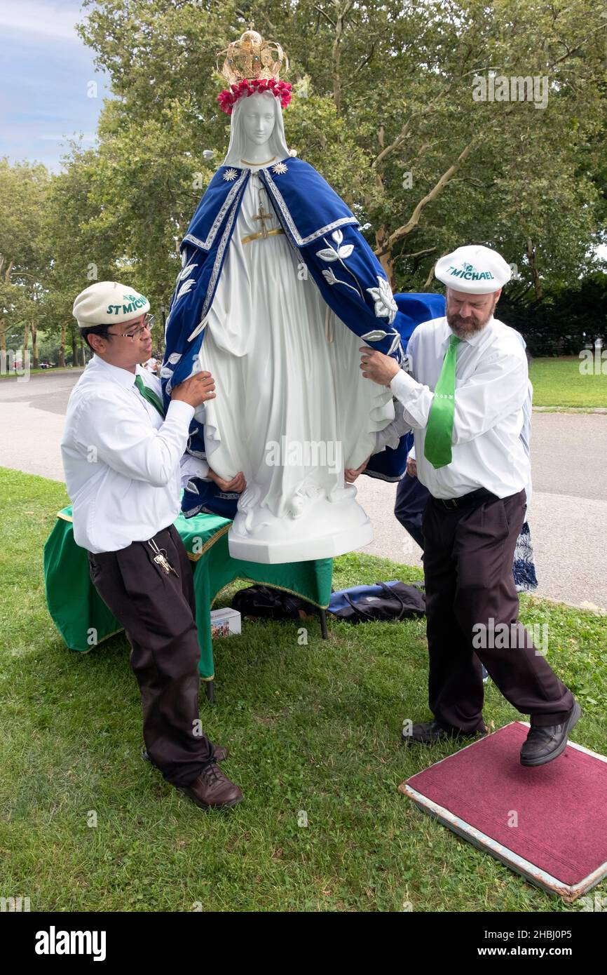 At the conclusion of an outdoor service, worshippers from Saint Michael