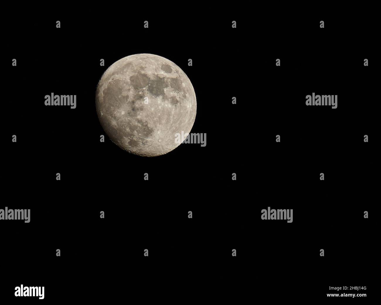The Moon in waxing gibbous phase over black sky Stock Photo Alamy
