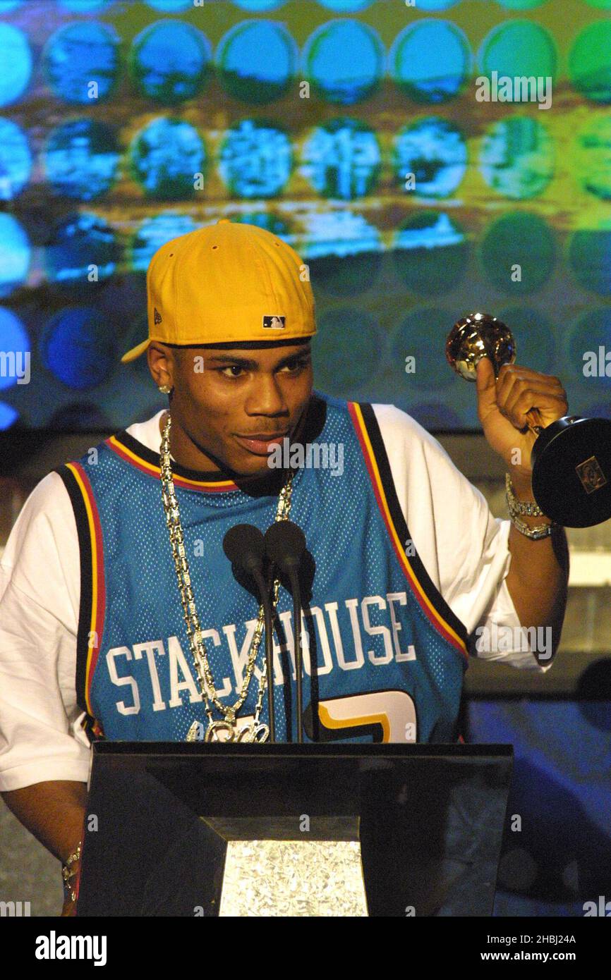 Nelly on stage at the Monte Carlo Music Awards which took place in Monte  Carlo. Half Length. basketball sports shirt top, necklace, cap, hat Stock  Photo - Alamy