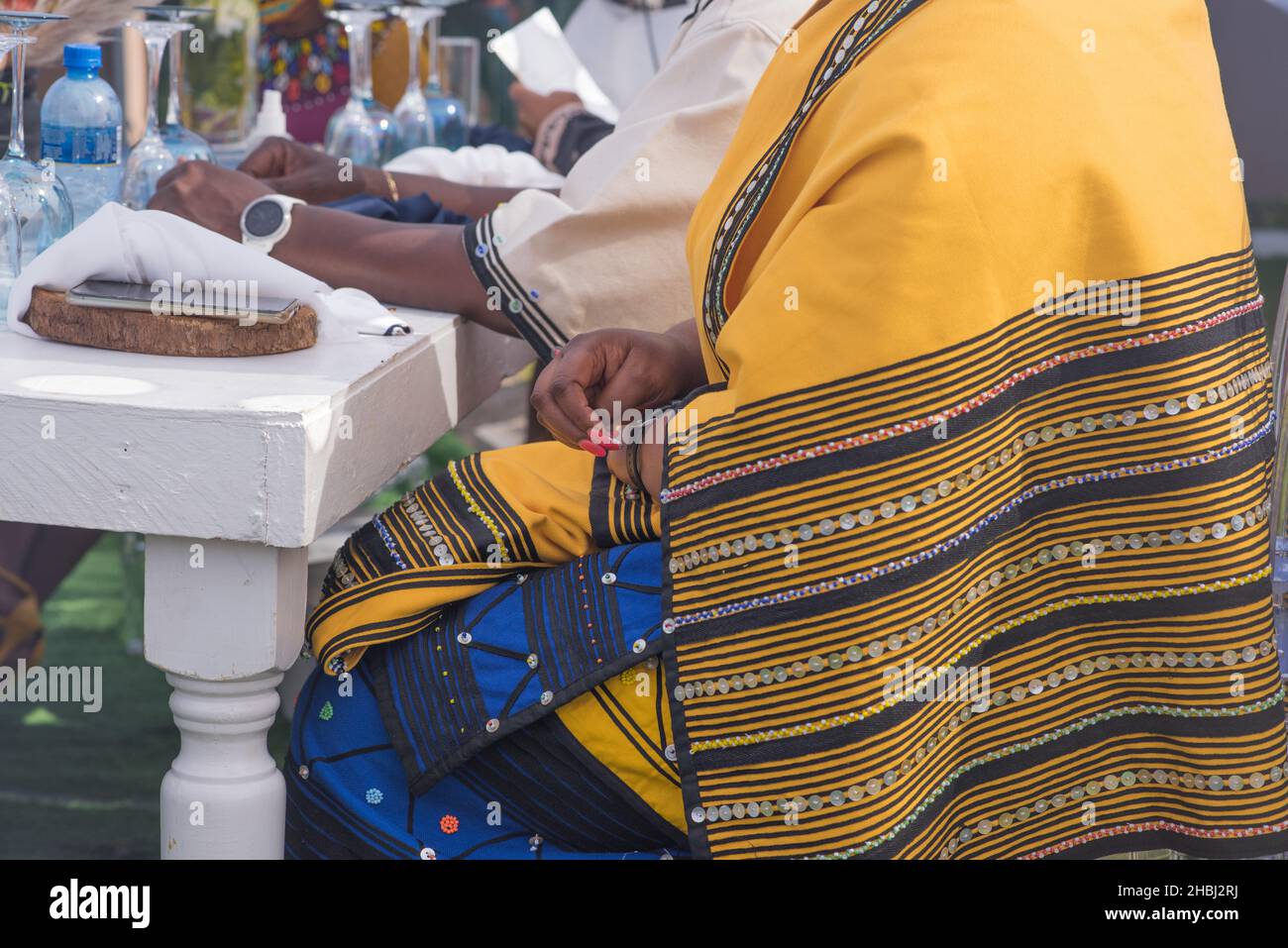 midsection shot of woman in traditional attire Stock Photo