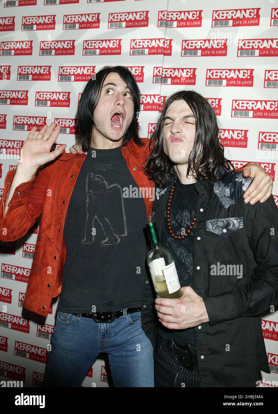Dawn from the Datsuns with vocalist from the Eighties Matchbox Disaster attend Kerrang Awards 2003 at the Royal Lancaster Hotel in London. Funny Stock Photo