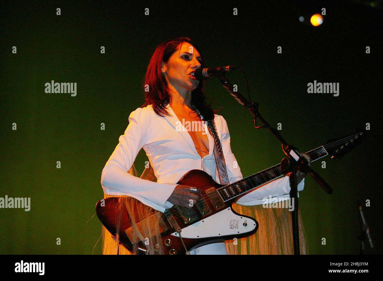 PJ Harvey performs live on stage at the Tate Modern Gallery London. Stock Photo