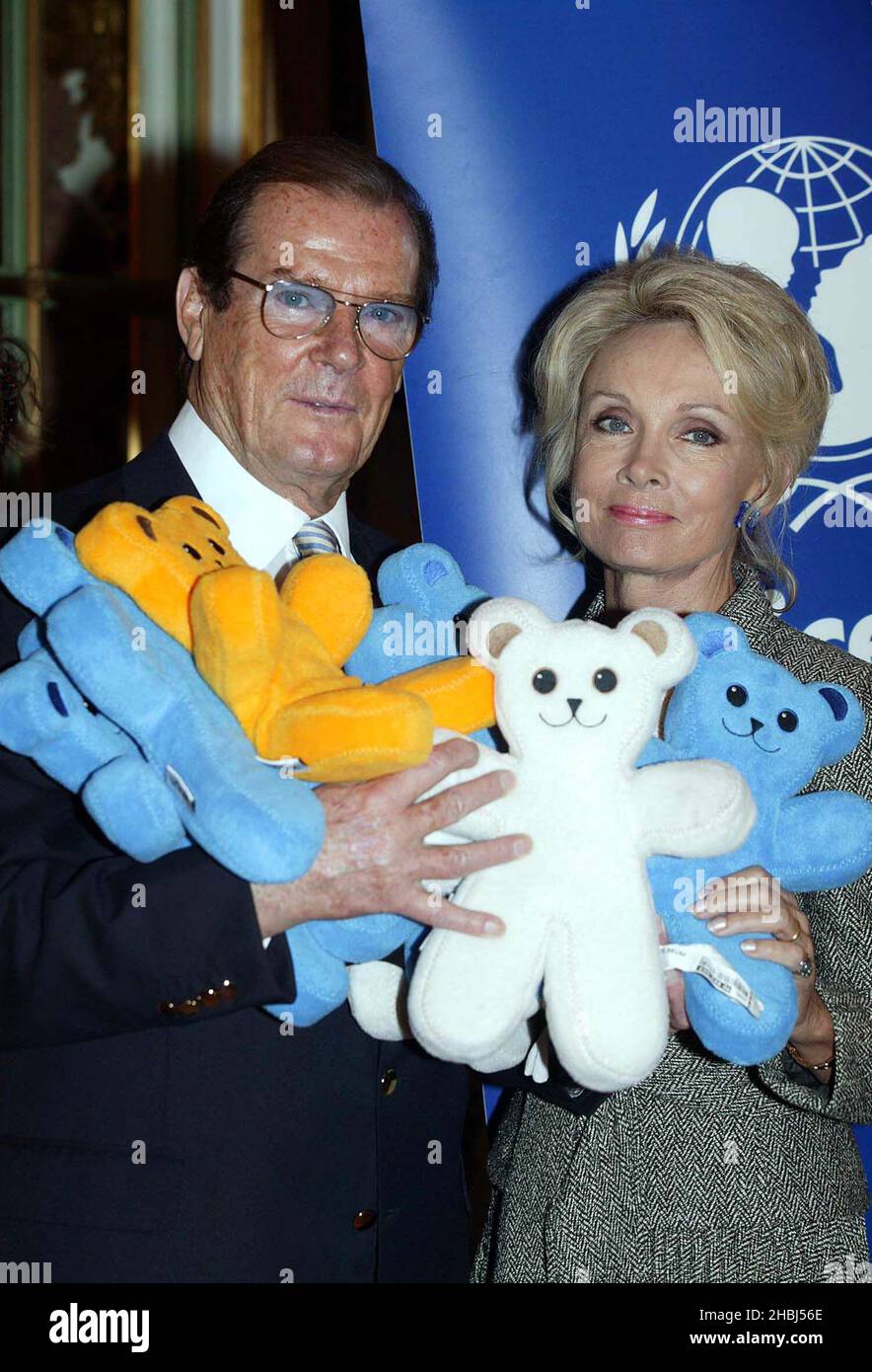 Sir Roger Moore with teddy bears and his wife Lady Christina supports UNICEF & Ikea at the Ritz West London Stock Photo