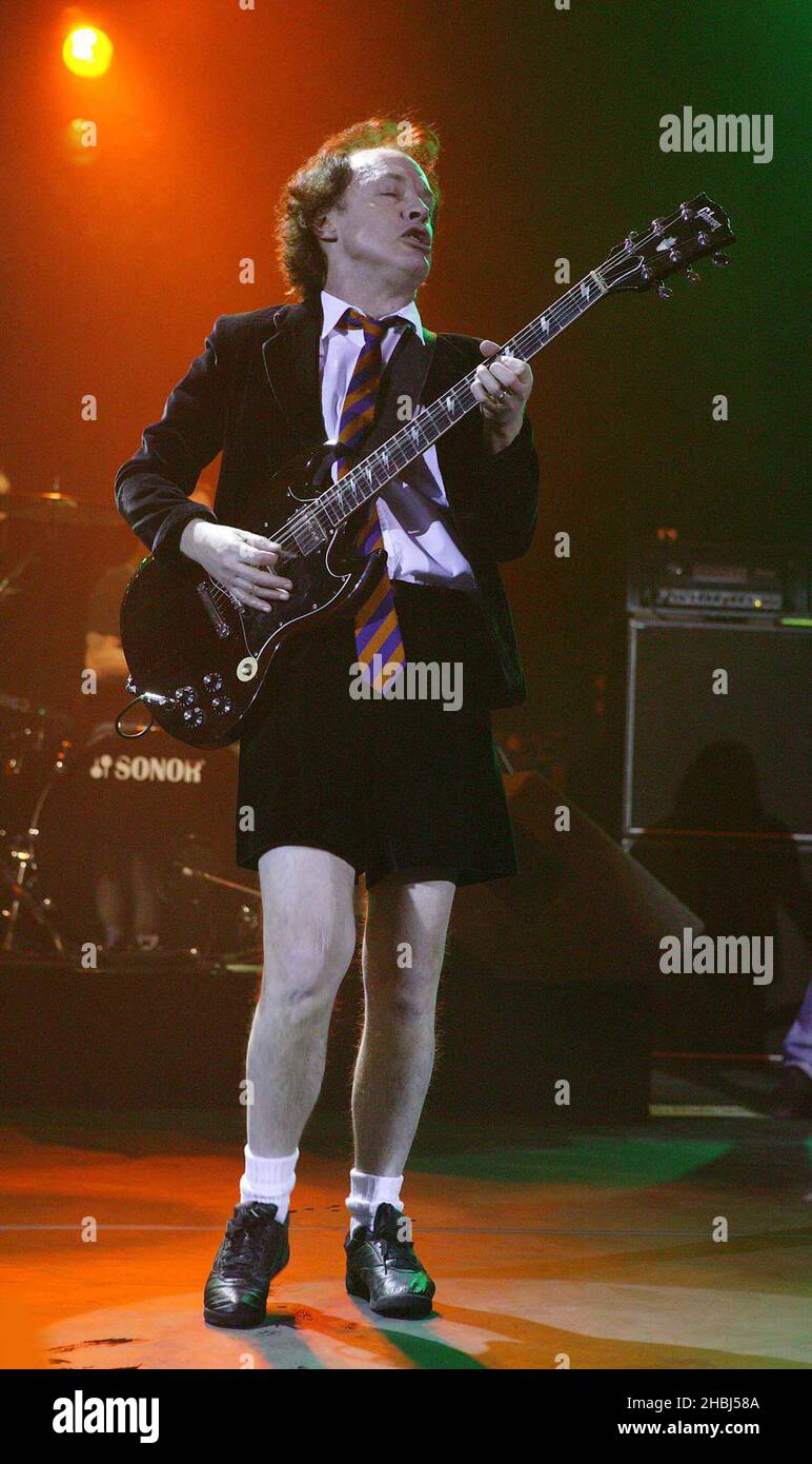 Angus Young and ACDC perform live on stage at the Hammersmith Apollo in London. Stock Photo