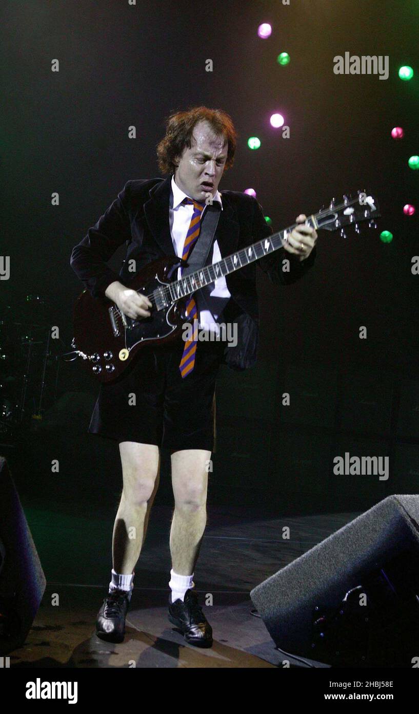 Angus Young and ACDC perform live on stage at the Hammersmith Apollo in London. Stock Photo