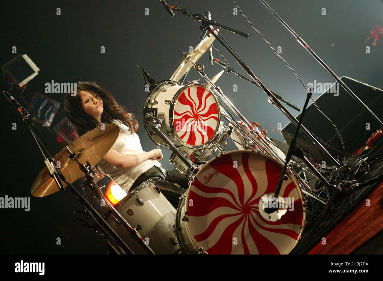The White Stripes (Meg and Jack White)perform on stage at Carling Brixton Academy, London. (Meg WHite on Drums) Stock Photo
