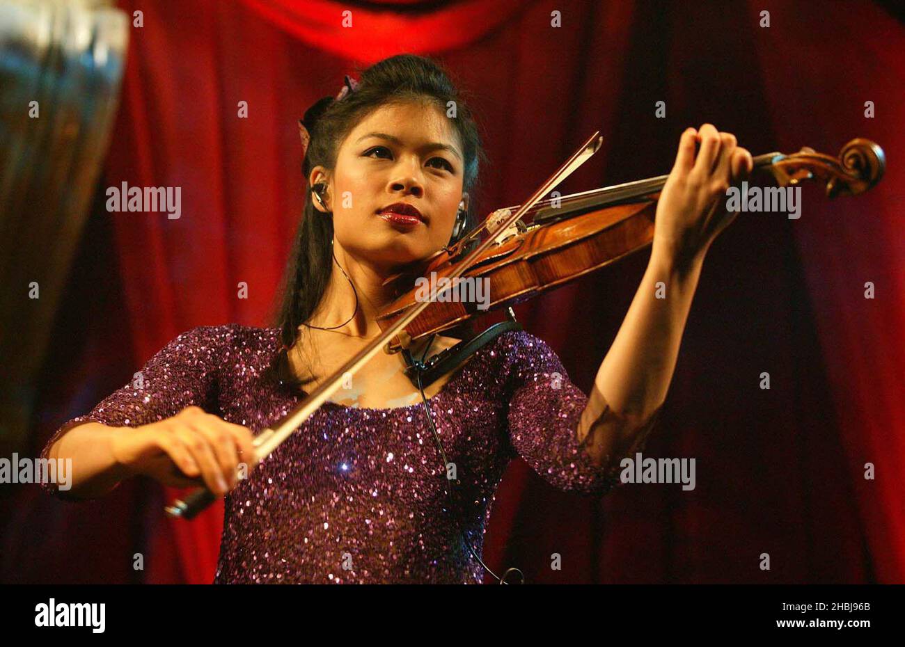 Vanessa Mae performs at the Classical Brit Awards nominations announcement at the Landmark Hotel in London. Stock Photo