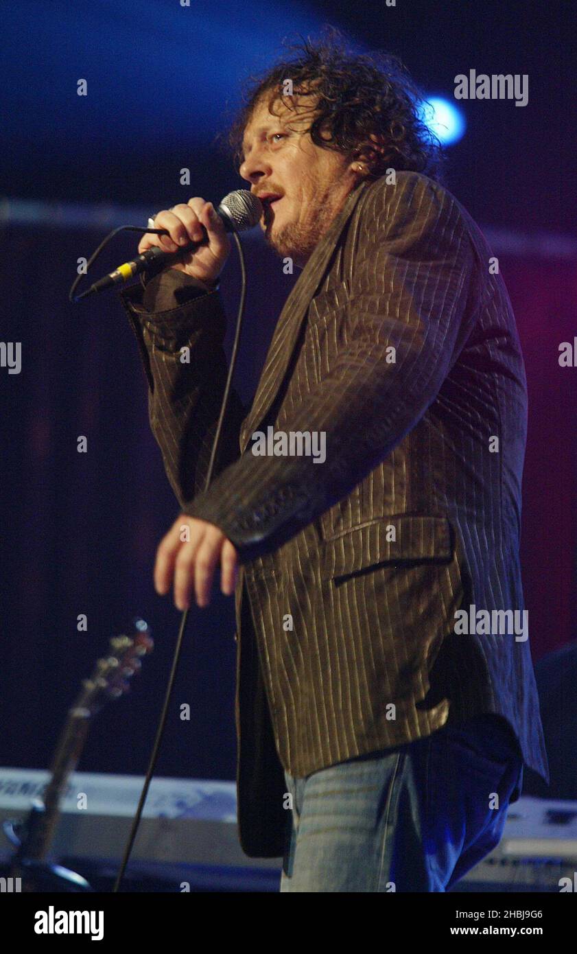Zucchero performs on stage at benefit show in aid of the United Nations' UNHCR refugees fund, at The Royal Albert Hall on May 6, 2004 in London. Show celebrates release of his new album of duets, and features special guests including Luciano Pavarotti, Ronan Keating, Dolores O'Riordan, Solomon Burke and Eric Clapton. Stock Photo
