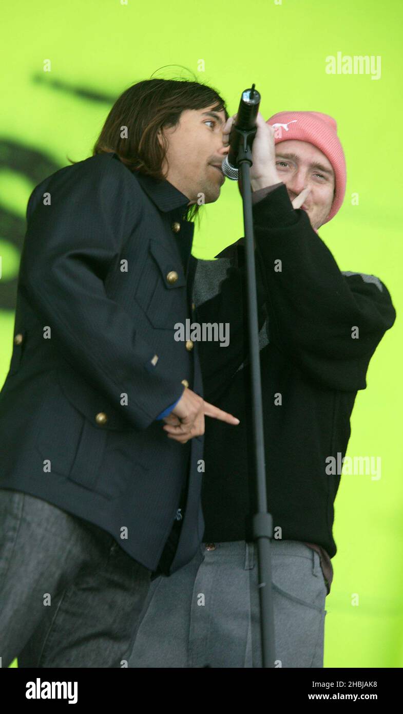 Anthony Keidis and John Frusciante introduces the Chicks on Speed support and open The Red Hot Chili Peppers Concert performing live on stage at Hyde Park in London. Stock Photo