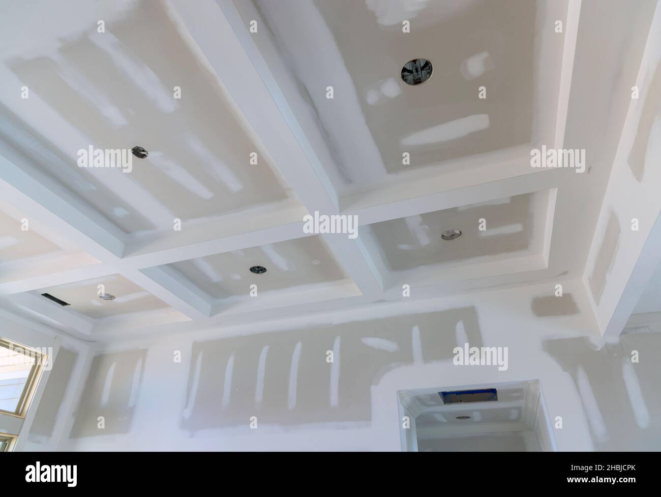 Finishing putty on drywall with a spatula wall Stock Photo Alamy