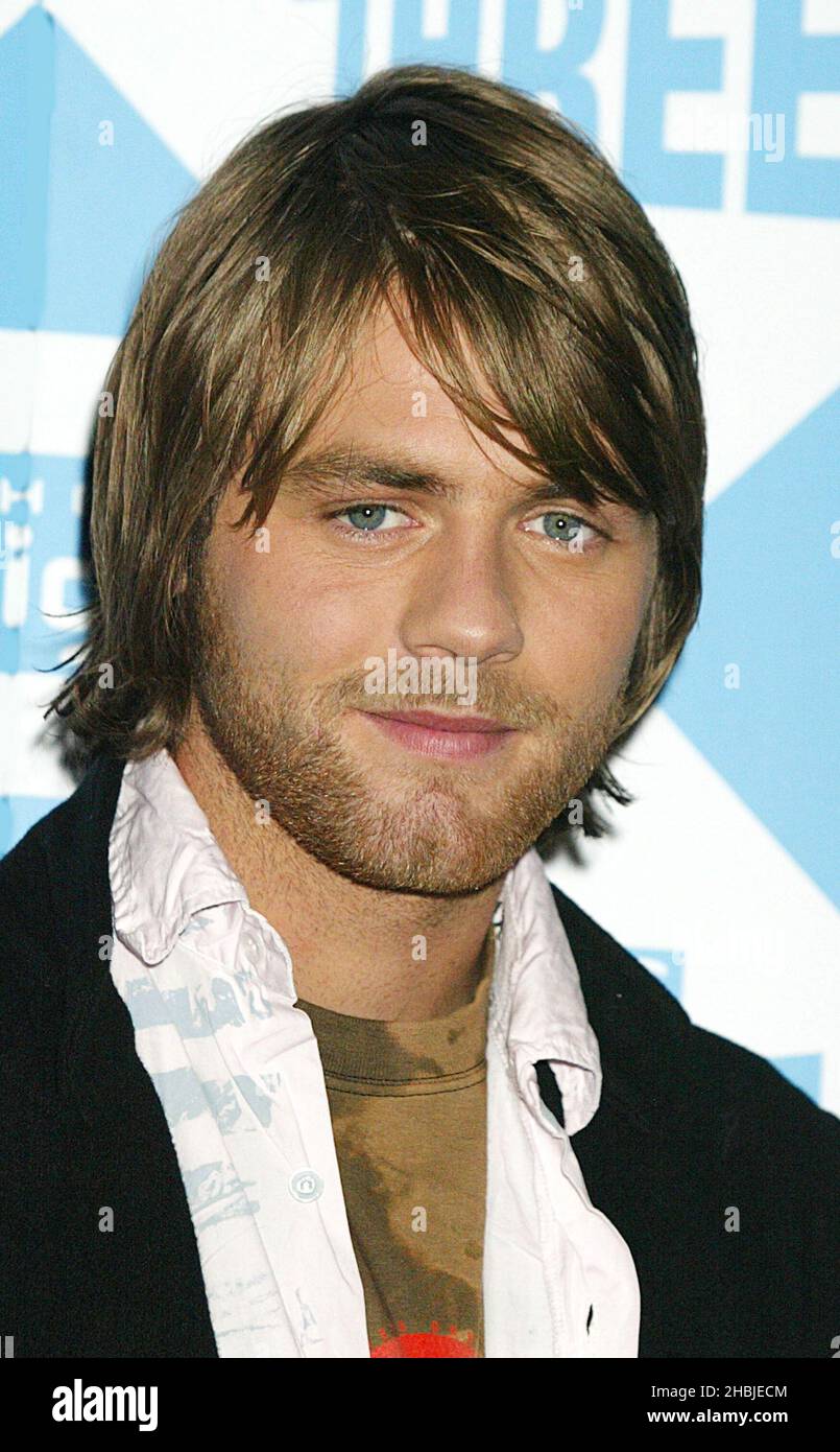 Brian McFadden arrives at 'The Big C - Fundraising Concert' at Alexandra Palace on October 30, 2004 in London. The concert - hosted by Lisa Snowdon and Reggie Yates - marks the end of the BBC's 'You, Me, & Cancer Awareness Month'. Stock Photo