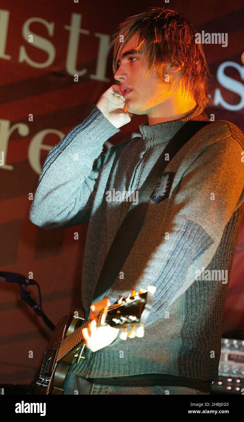 Busted; Charlie Simpson; attend and perform on stage at the annual Regent Street Christmas Lights switching-on ceremony, having performed live, in Regent Street on November 7, 2004 in London. Stock Photo