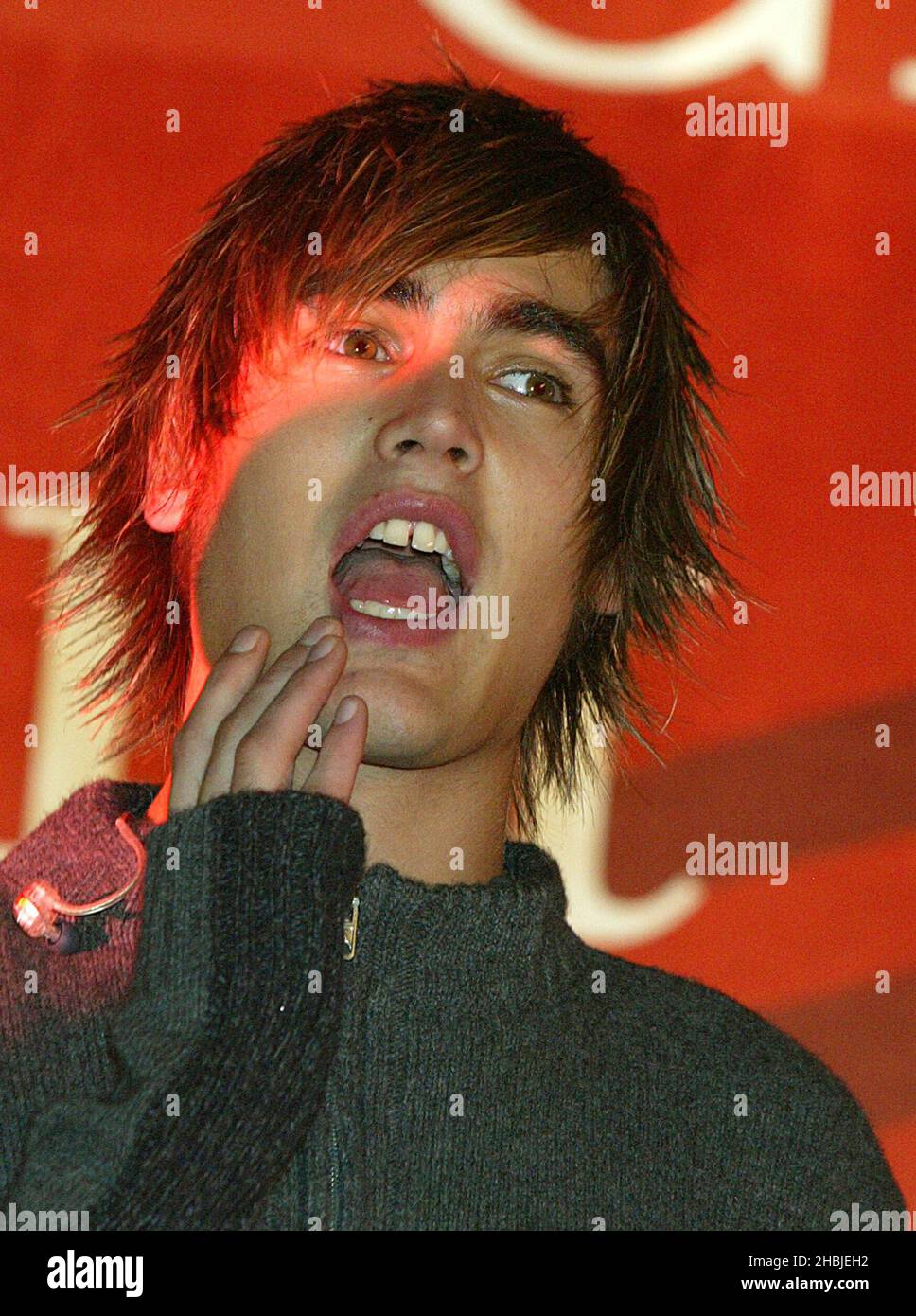 Busted; Charlie Simpson; attend and perform on stage at the annual Regent Street Christmas Lights switching-on ceremony, having performed live, in Regent Street on November 7, 2004 in London. Head Shot Funny Stock Photo