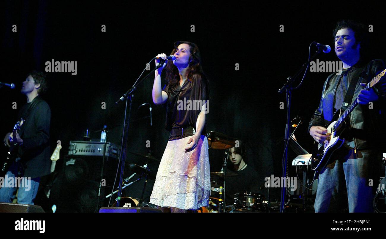 Hollywood actress turned singer/songwriter Minnie Driver supports Neil and Tim Finn during the final dates of their UK tour at the Carling Apollo Hammersmith on November 6, 2004 in London. Stock Photo