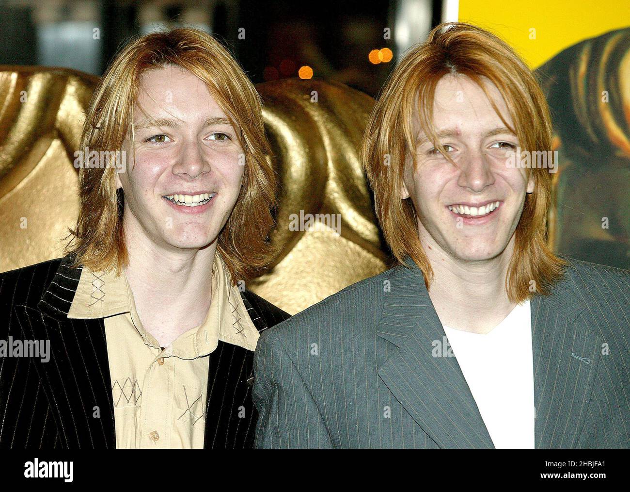 Jamie and Oliver Phelps pose at arrivals at the 'British Academy Children's Film & Television Awards' at the London Hilton, Park Lane on November 27, 2004 in London. Stock Photo