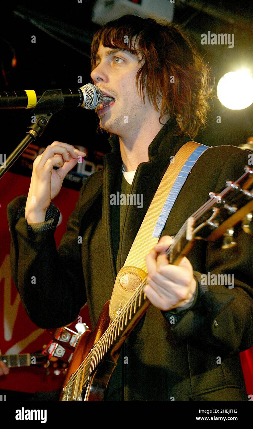 Johnny Borrell of London-based indie-rock band Razorlight play live and sign copies of their latest single 'Rip It Up', released November 29, at Virgin Megastore, Oxford Street on December 2, 2004 in London. Stock Photo