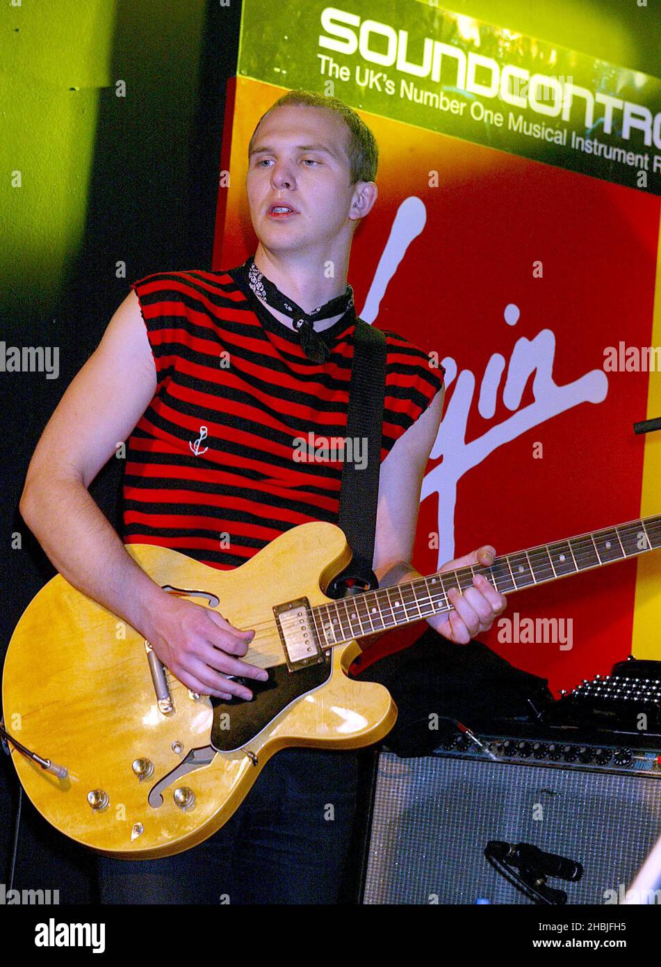 Bjorn Agren of London-based indie-rock band Razorlight play live and sign copies of their latest single 'Rip It Up', released November 29, at Virgin Megastore, Oxford Street on December 2, 2004 in London. Stock Photo