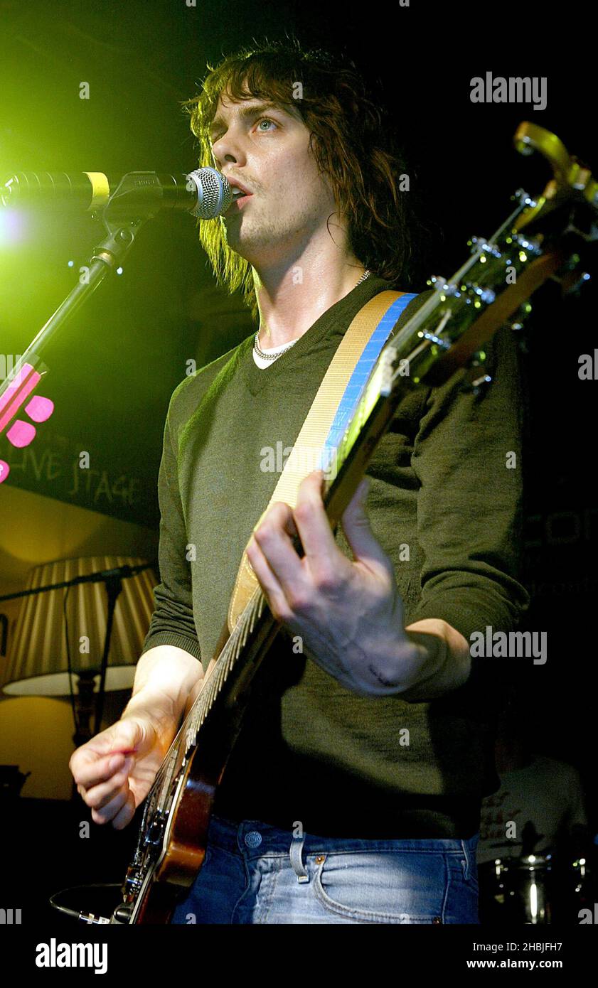 Johnny Borrell of London-based indie-rock band Razorlight play live and sign copies of their latest single 'Rip It Up', released November 29, at Virgin Megastore, Oxford Street on December 2, 2004 in London. Stock Photo