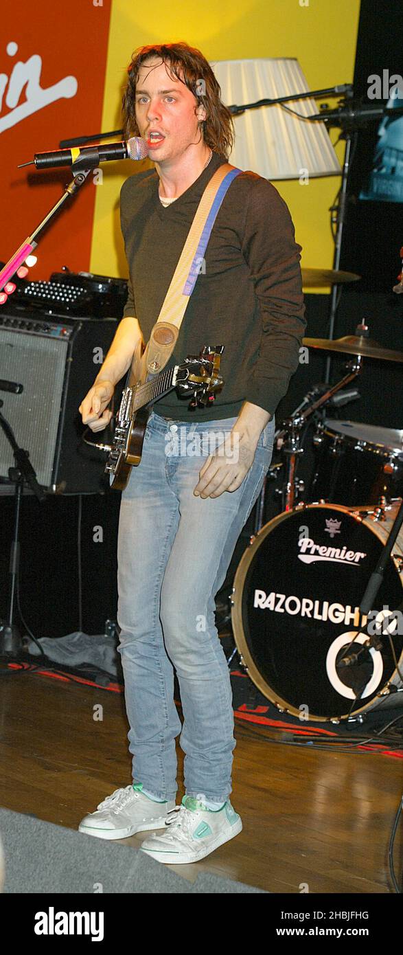 Johnny Borrell of London-based indie-rock band Razorlight play live and sign copies of their latest single 'Rip It Up', released November 29, at Virgin Megastore, Oxford Street on December 2, 2004 in London. Stock Photo