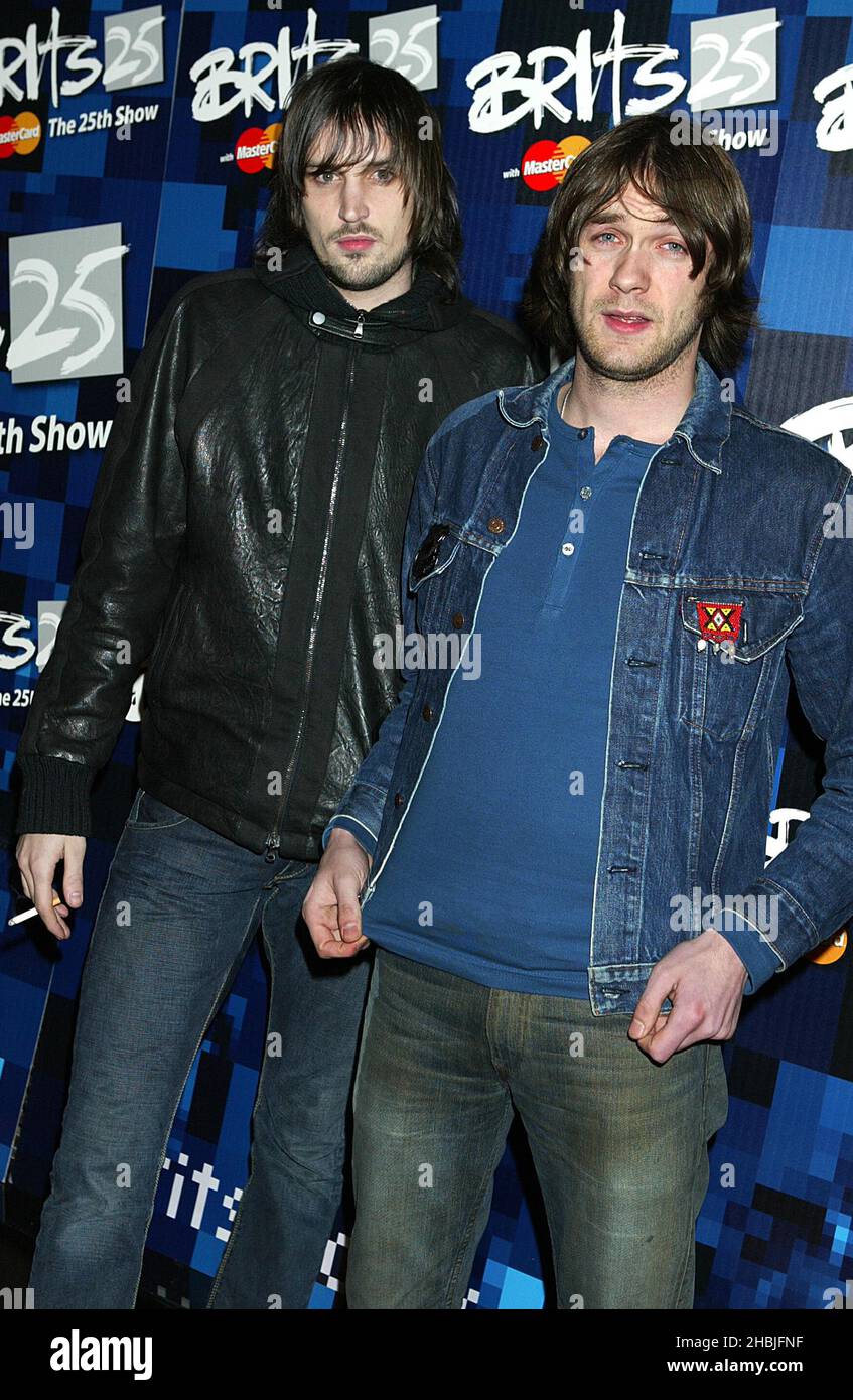 Tom Meighan and Sergio Pizzorno of Kasabian attend the "Brit Awards 2005  Shortlist Announcement" at the Park Lane Hotel on January 10, 2005 in  London Stock Photo - Alamy