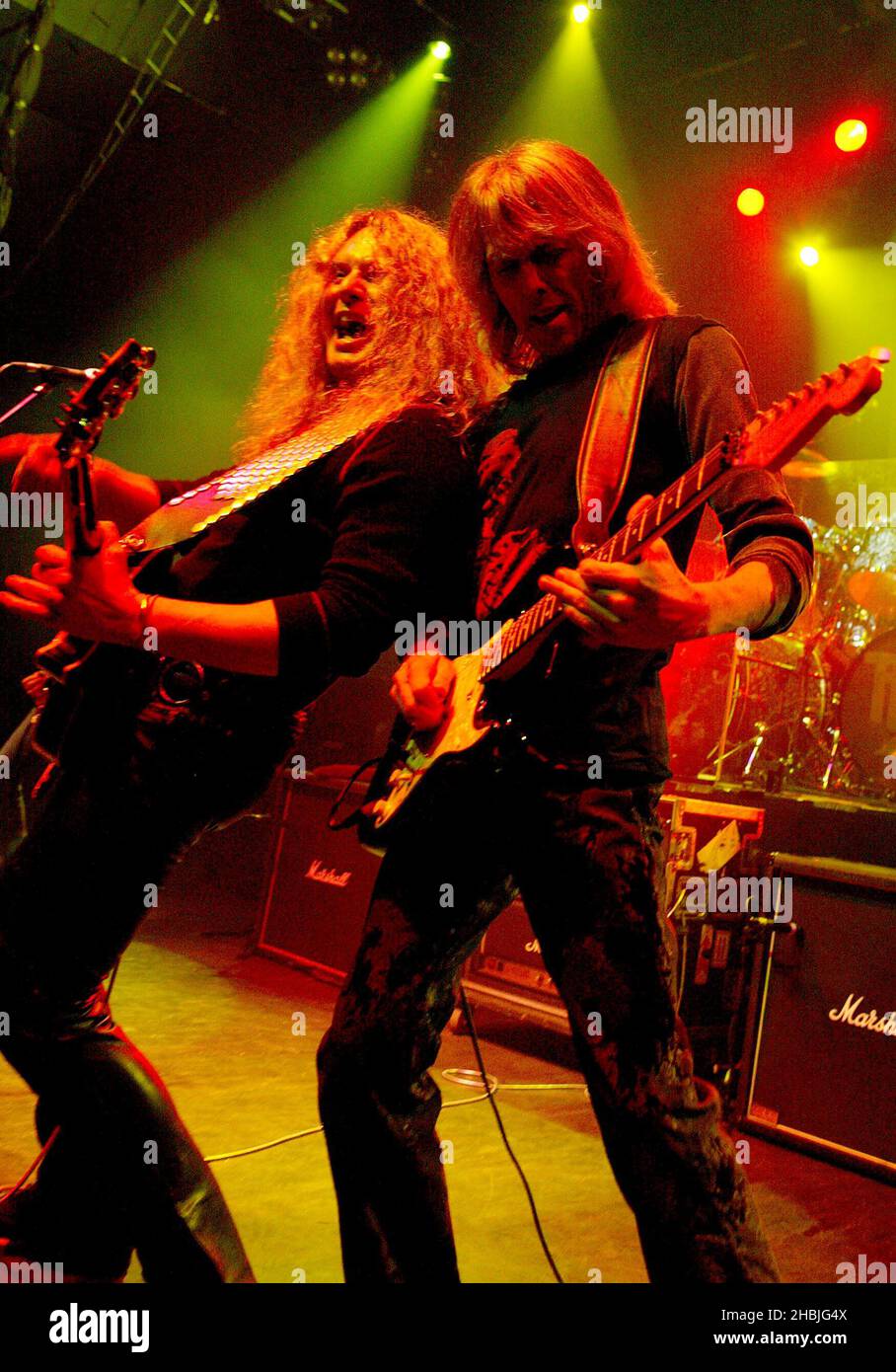 Scott Gorham vocalist and John Sykes original guitarist of rock band Thin Lizzy performs on stage during London date of their UK tour, at the Shepherds Bush Empire in London. Stock Photo