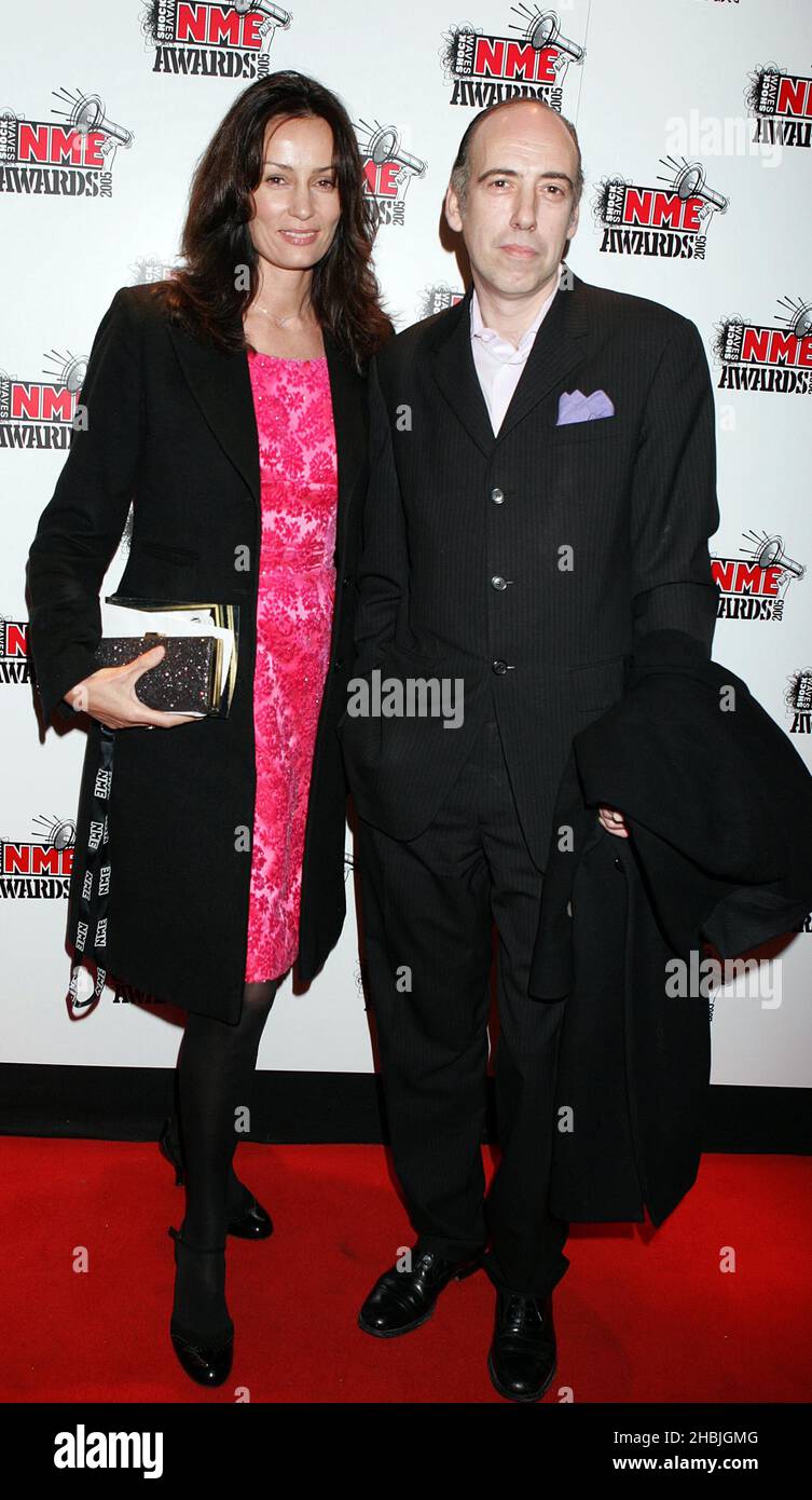 Mick Jones of The Clash and girlfriend arrives at inside arrivals at