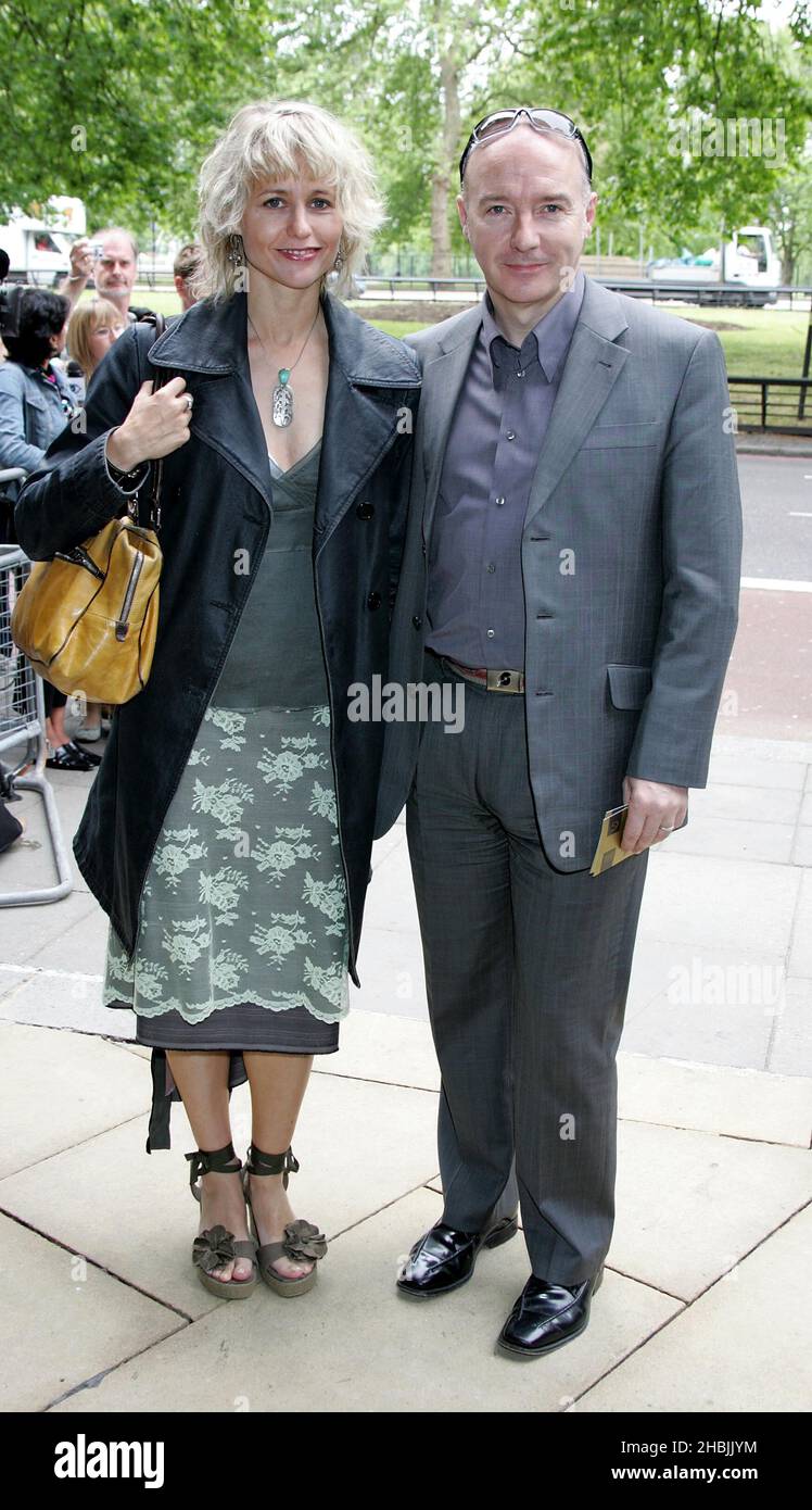 Midge Ure and wife arrive at the Ivor Novello Awards at the Grosvenor House Hotel in London. Head shot Stock Photo