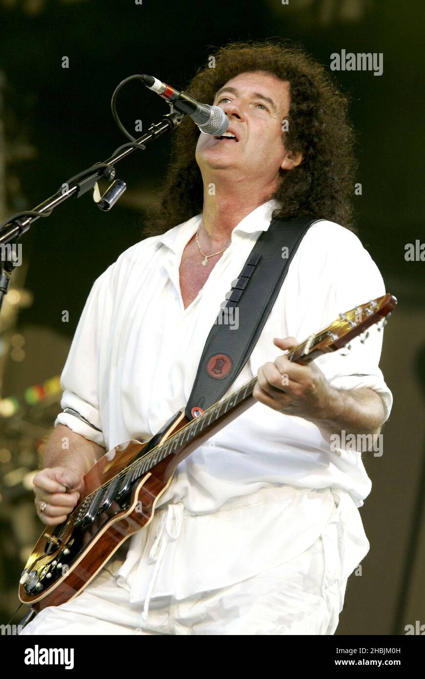 Brian May of Queen performs live on stage at Hyde Park in London Photo - Alamy
