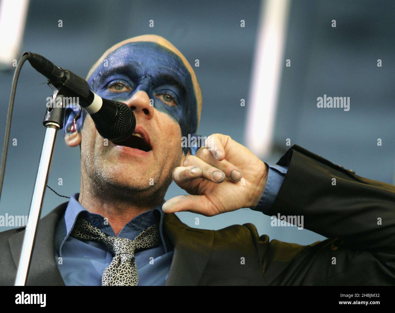 Michael Stipe of British Indie group REM performs on stage at their second London show this year, in Hyde Park on July 16, 2005 in London. Stock Photo