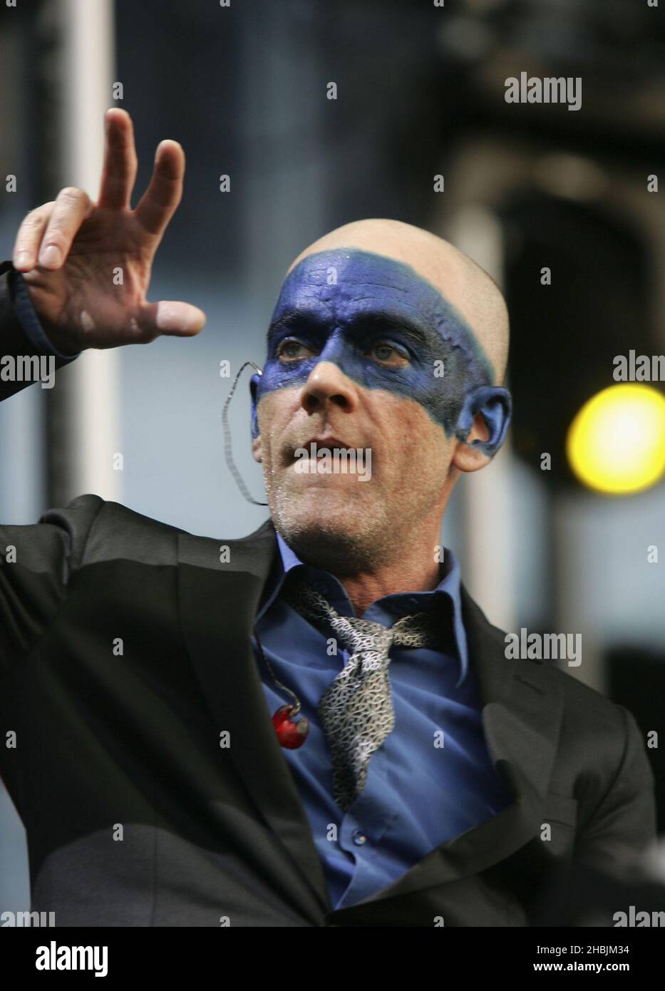 Michael Stipe of British Indie group REM performs on stage at their second London show this year, in Hyde Park on July 16, 2005 in London. Stock Photo