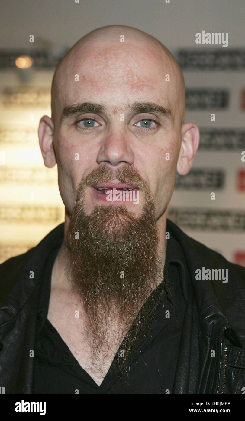 Nick Oliveri ex of Queens of Stone Age poses in Awards Room at the Kerrang! Awards 2005, at the Brewery in London. Stock Photo