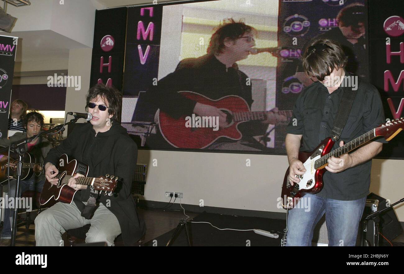 Ian McCulloch and Will Sergeant of Echo and the Bunnymen play an acoustic gig and sign records to celebrate the launch of HMV's digital download service at HMV on Oxford Street, London. Stock Photo