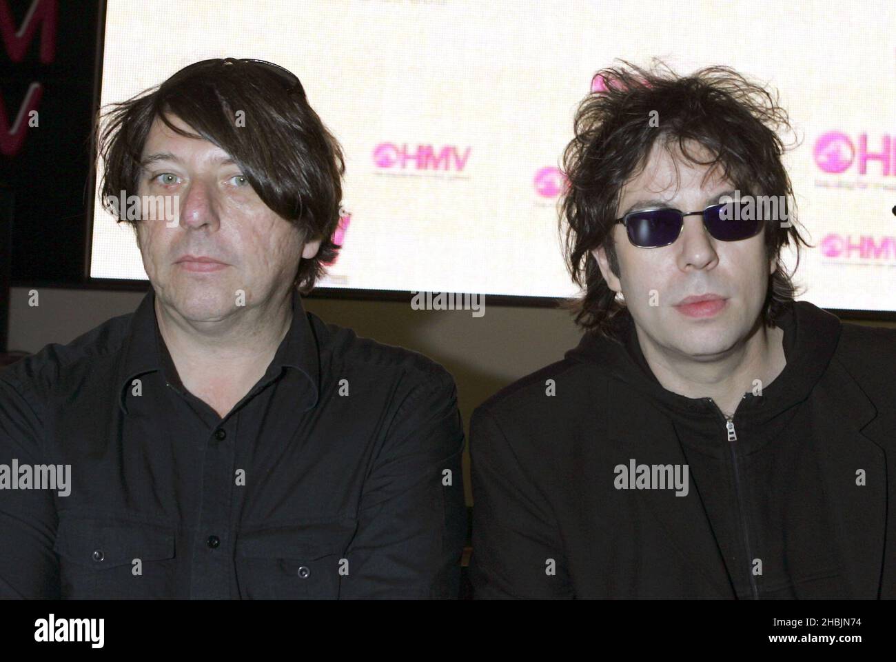 Ian McCulloch and Will Sergeant of Echo and the Bunnymen play an acoustic gig and sign records to celebrate the launch of HMV's digital download service at HMV on Oxford Street, London. Stock Photo