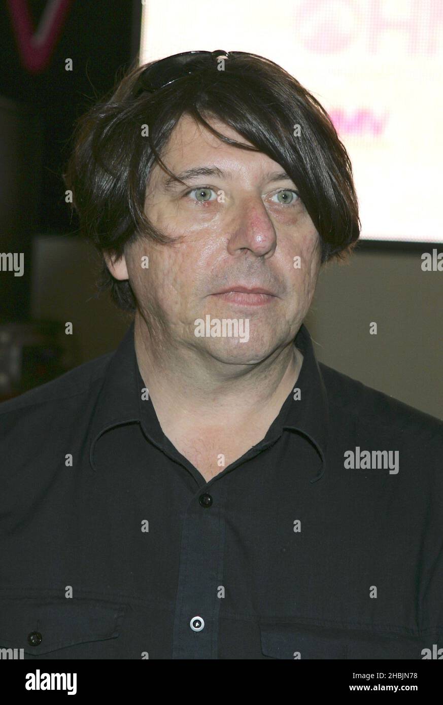 Will Sergeant of Echo and the Bunnymen play an acoustic gig and sign records to celebrate the launch of HMV's digital download service at HMV on Oxford Street, London. Stock Photo