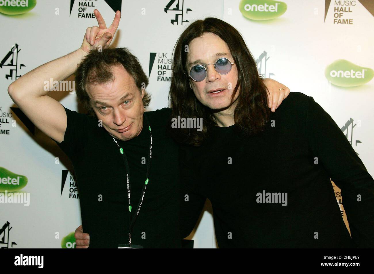 Ozzy Osbourne of Black Sabbath and Angus Young of ACDC pose in press ...