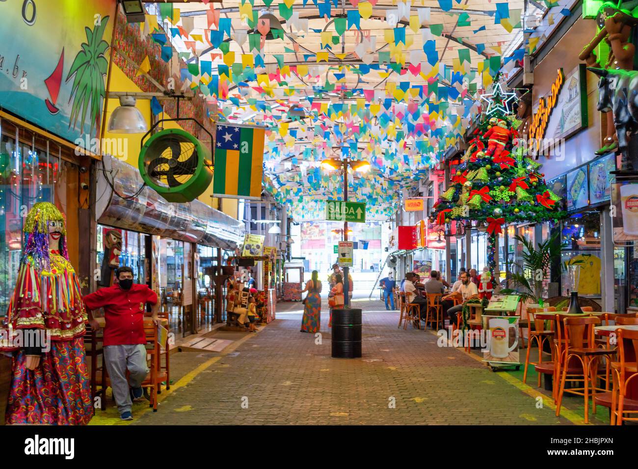 Patio restaurant business on alley inside of the 'Feira Sao Cristovao'. The Saint Christopher Fair is a famous place and a tourist attraction which fe Stock Photo