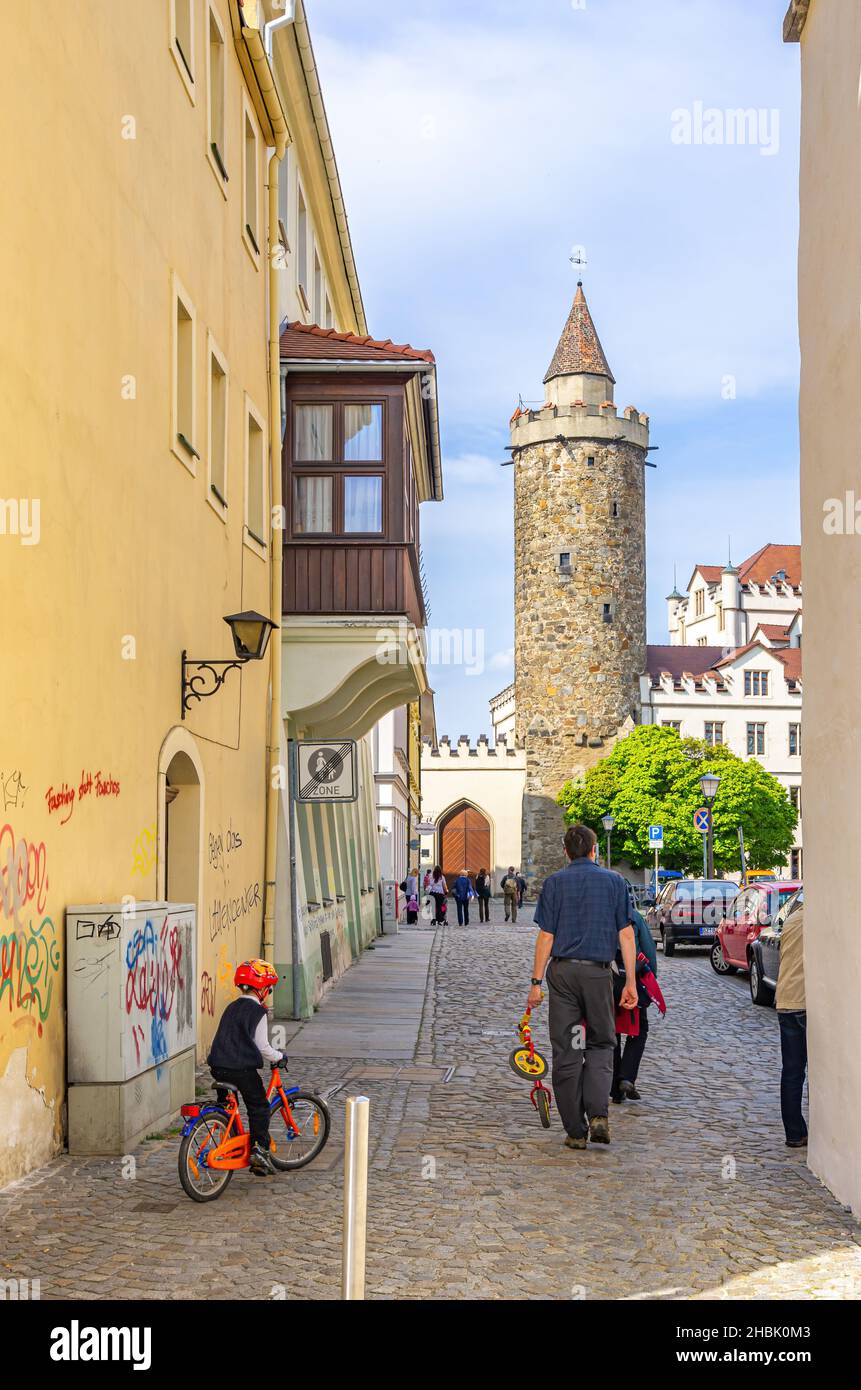 Bautzen, Upper Lusatia, Saxony, Germany: Street scene on Buttermarkt square looking towards Wendish Tower (Wendischer Turm), on April 20, 2014. Stock Photo