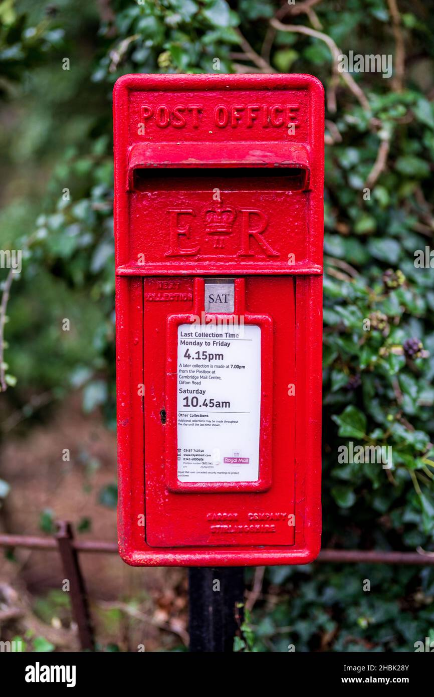 Red Postbox - Red British Letter Box. Red British Post Box - UK Red Post Box - note photograph taken with shallow depth of field Stock Photo