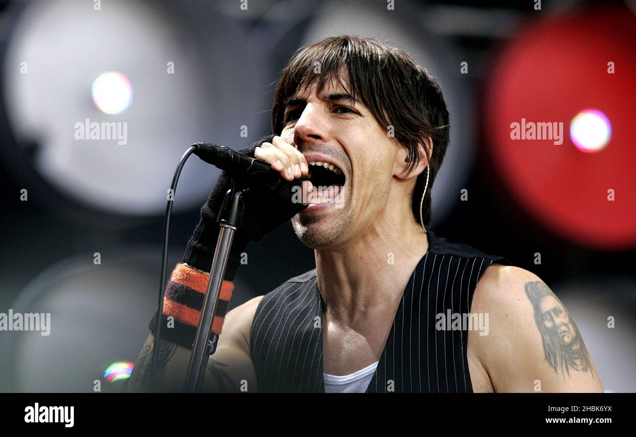 Red Hot Chili Peppers perform during the charity concert at Wembley Stadium, London. Stock Photo