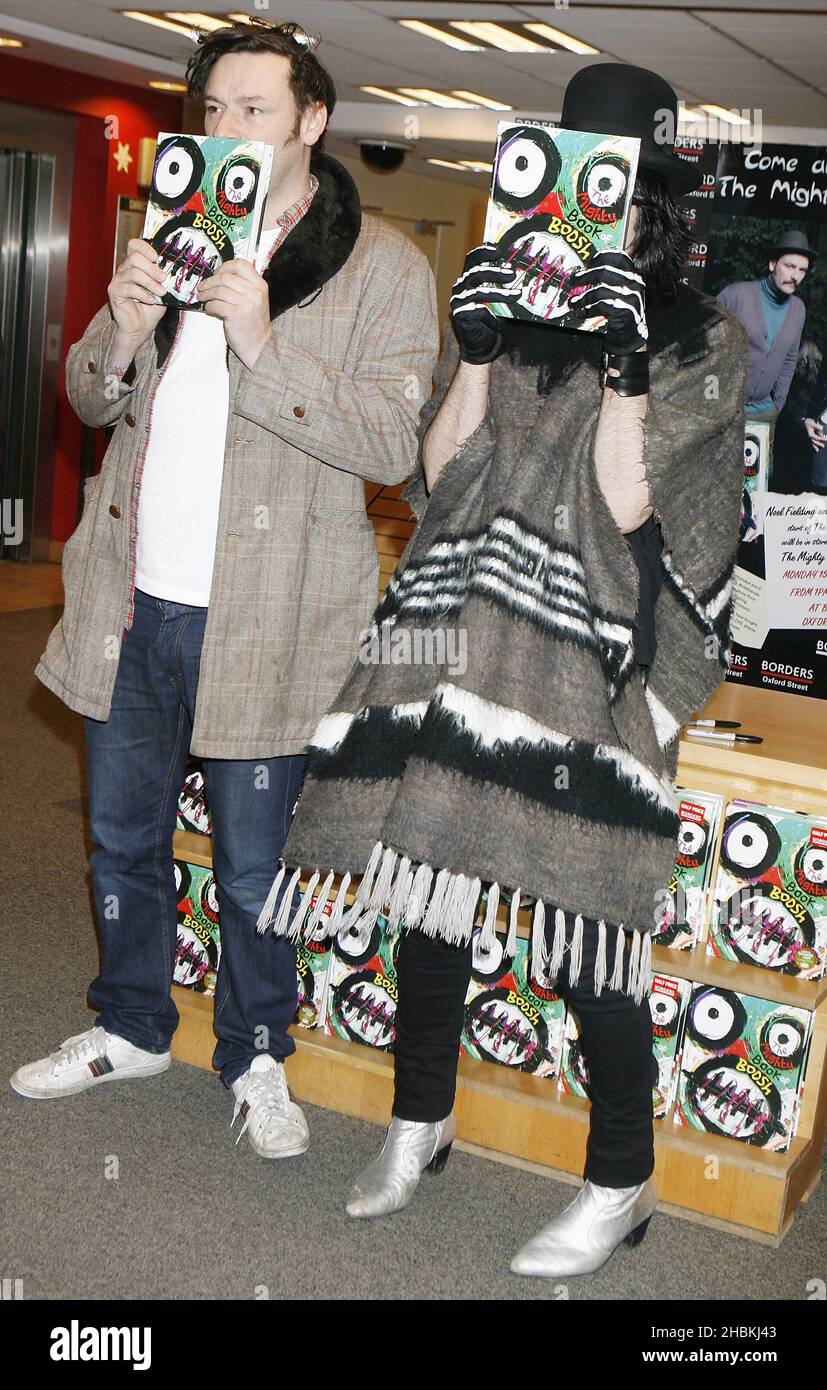 Noel Fielding signs with Julian Barrett their MIghty Boosh Book at Borders, Oxford Street, London. Stock Photo