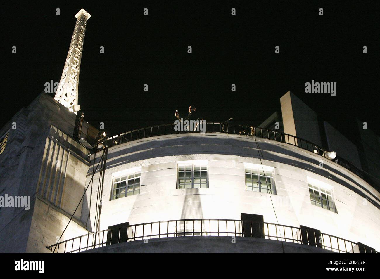 U2 perform several songs on top of BBC Broadcasting House in Portland Place, central London this evening during a secret gig. Stock Photo