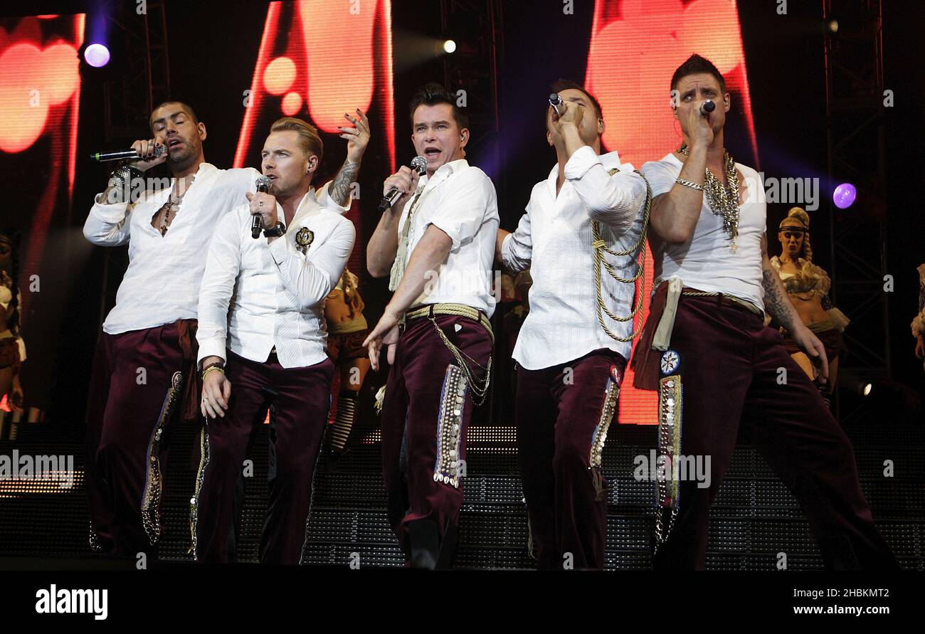 (Left - right) Shane Lynch, Ronan Keating, Stephen Gately, Mikey Graham and Keith Duffy of Boyzone perform at Wembley Arena, London Stock Photo