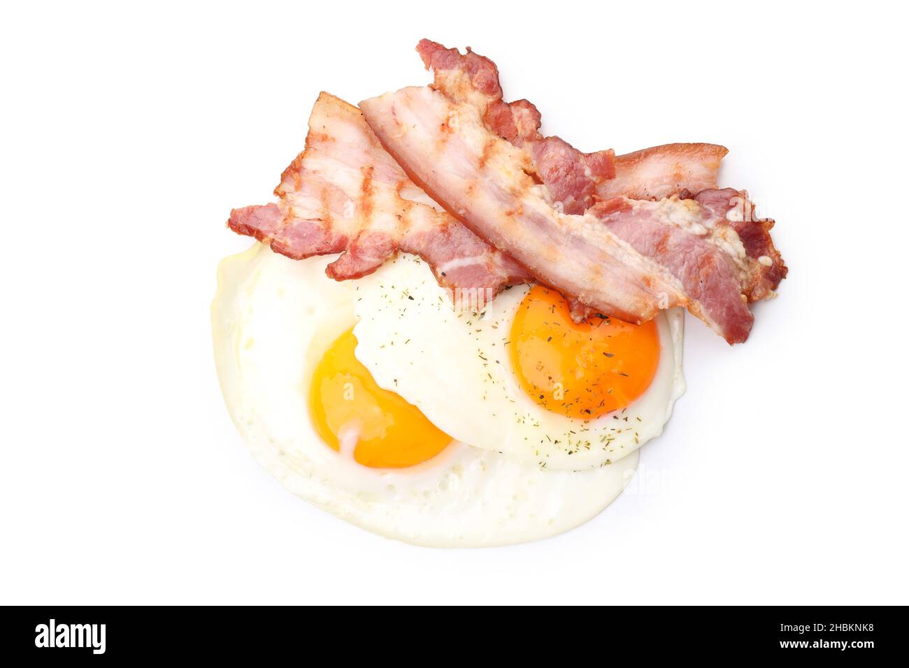 Fried eggs and bacon isolated on white background Stock Photo - Alamy