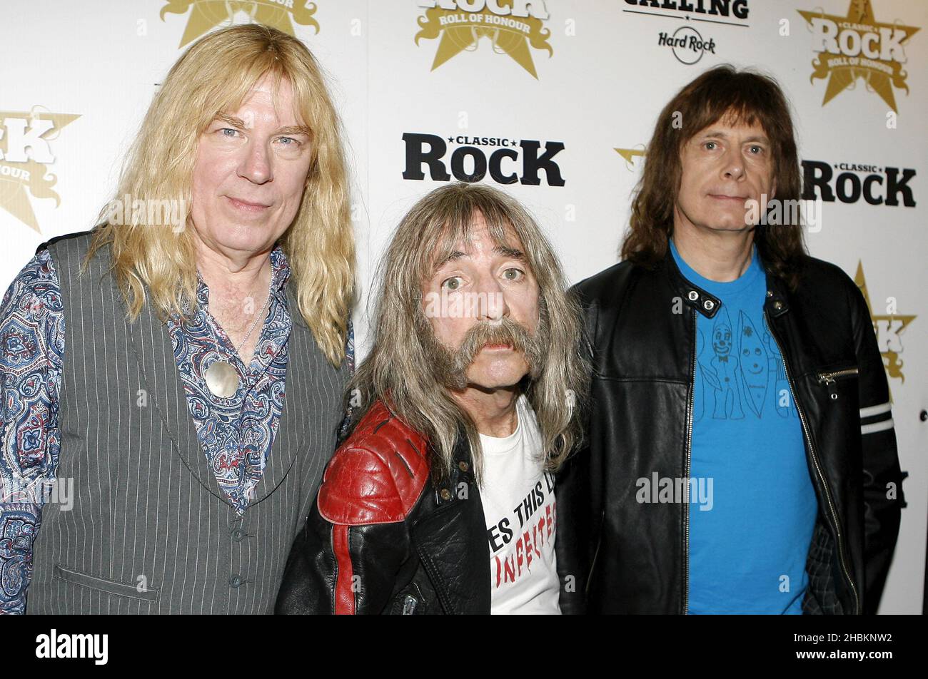 Spoof rock band Spinal tap, featuring, from left, David St. Hubbins (Michael McKean), Derek Smalls (Harry Shearer) and Nigel Tufnel (Christopher Guest) pose for pictures for the Classic Rock Roll of Honour Nominations launch at Hard Rock Cafe in Hyde Park, London Stock Photo
