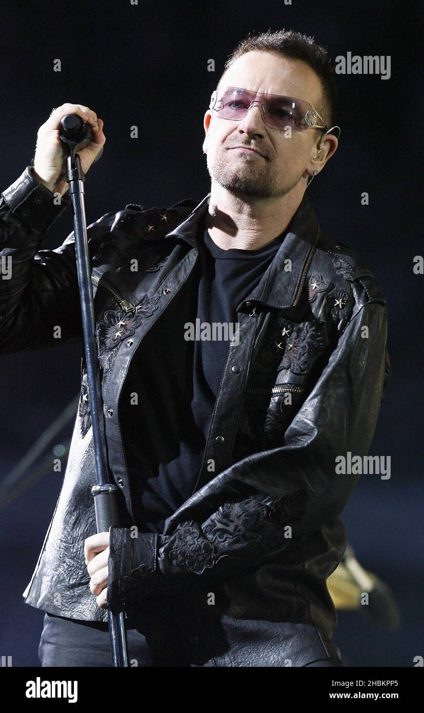 Bono performs with U2 at Wembley Stadium in London, UK Stock Photo