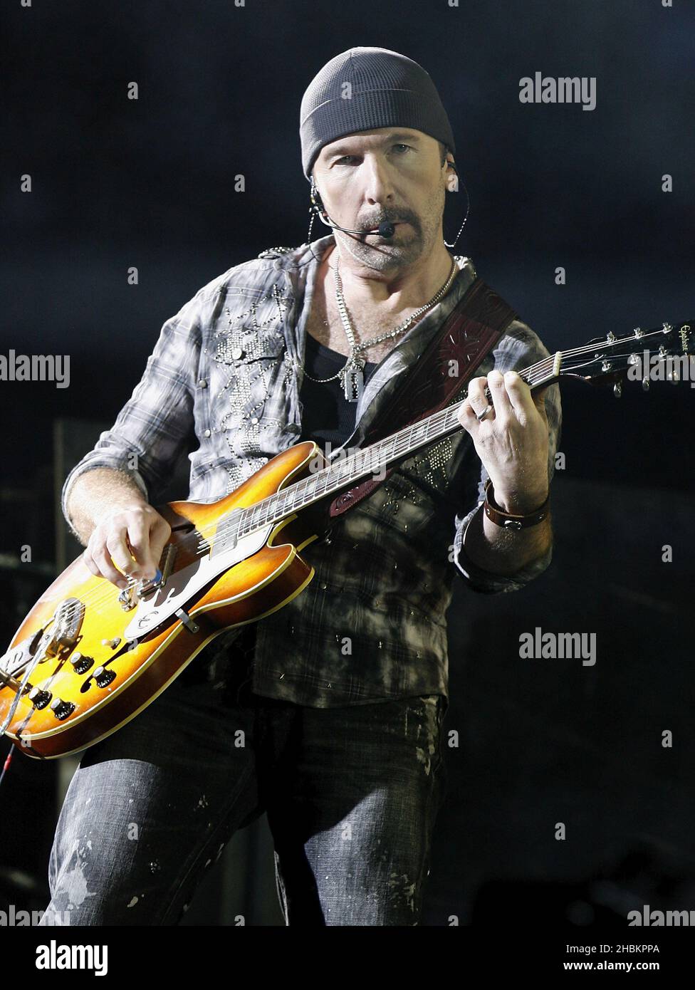The Edge performs with U2 at Wembley Stadium in London, UK Stock Photo