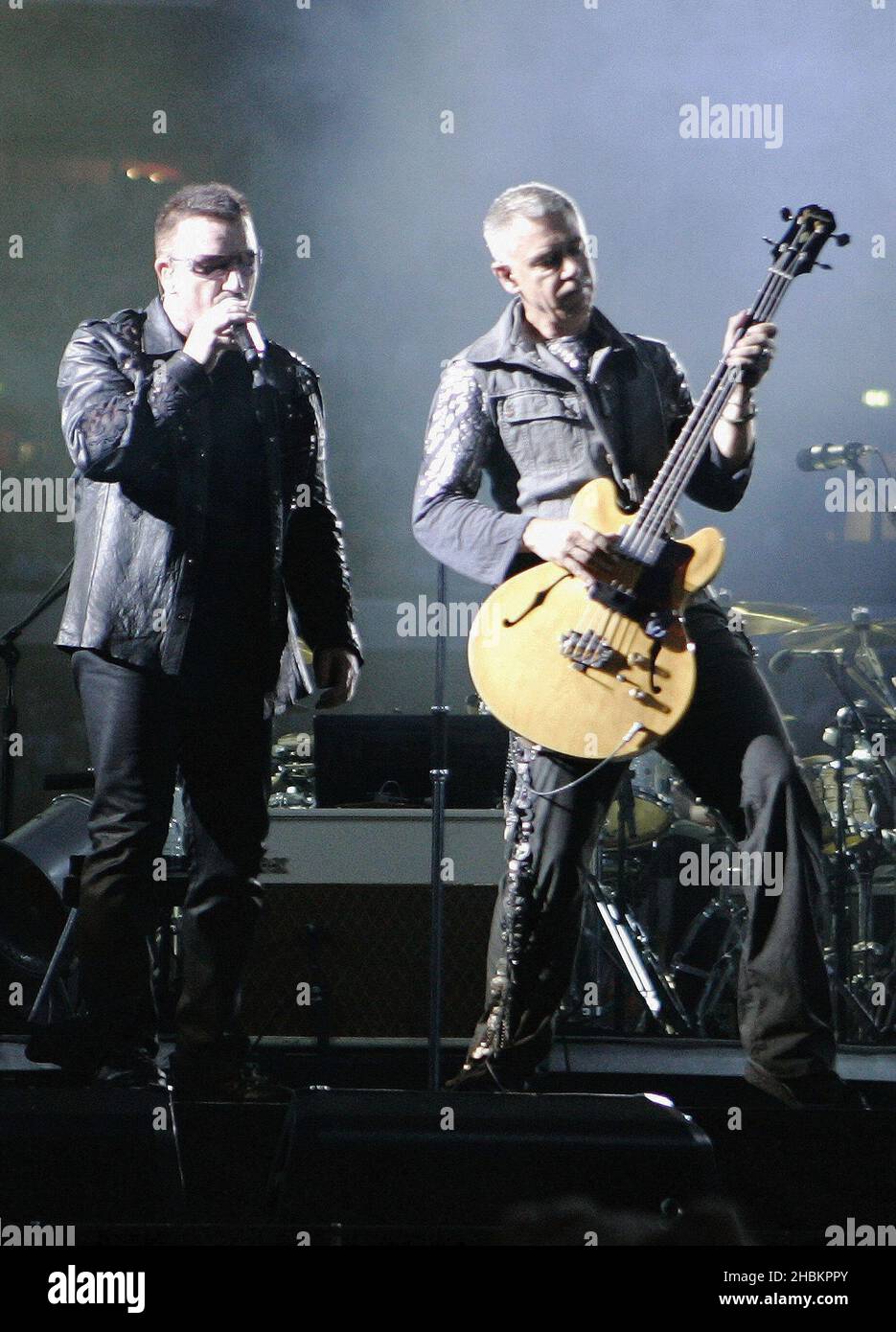Bono and Adam Clayton perform with U2 at Wembley Stadium in London, UK Stock Photo