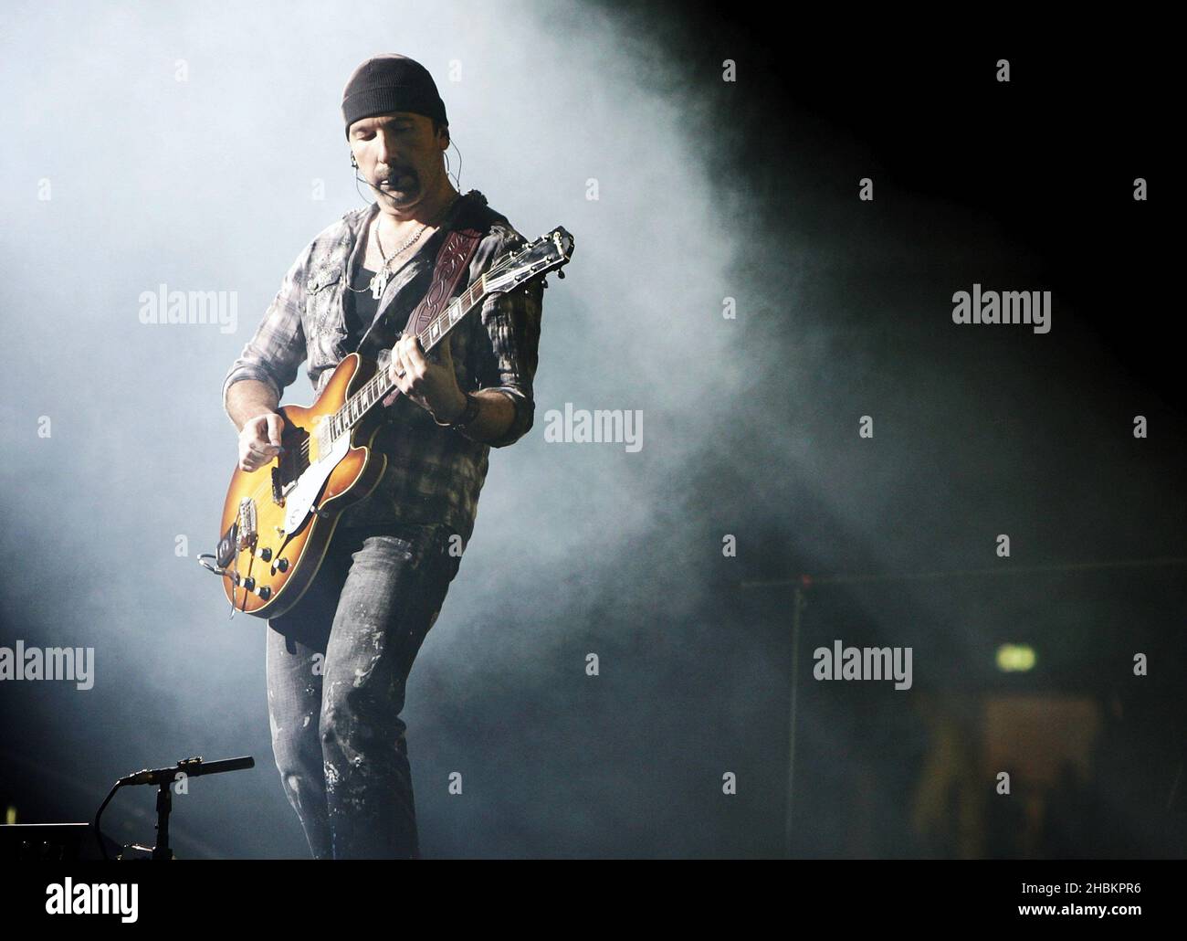 The Edge of U2 performs at Wembley Stadium, London. Stock Photo