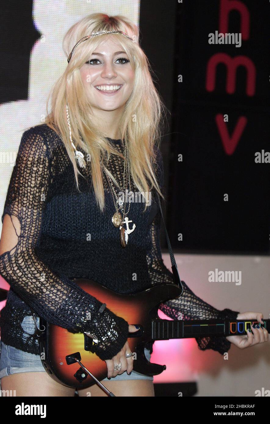 Pixie Lott launches the latest instalment of music making game, Guitar Hero at HMV Oxford Street in central London. Stock Photo
